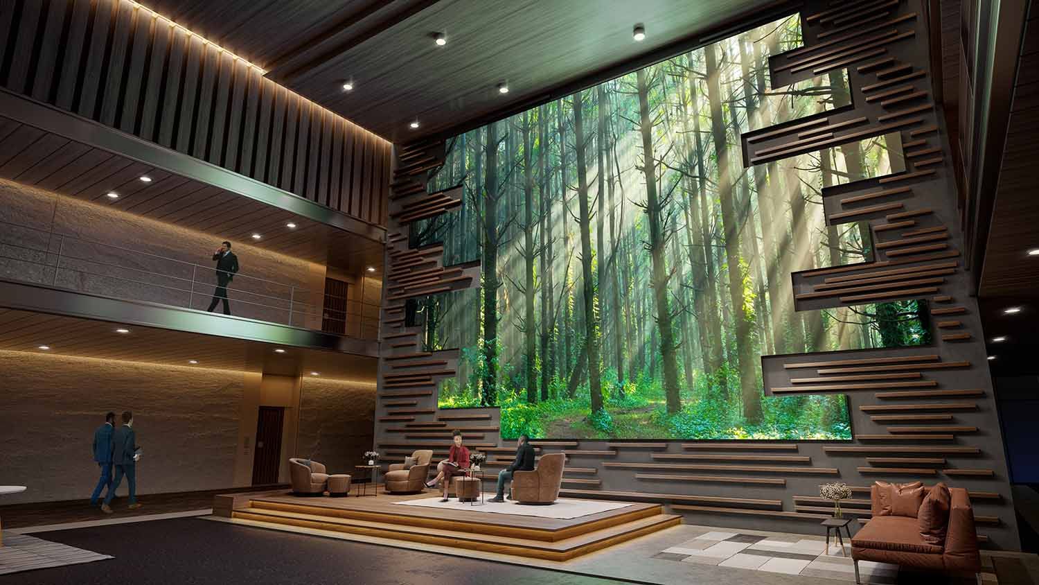 Modern lounge with a large digital forest-themed video wall