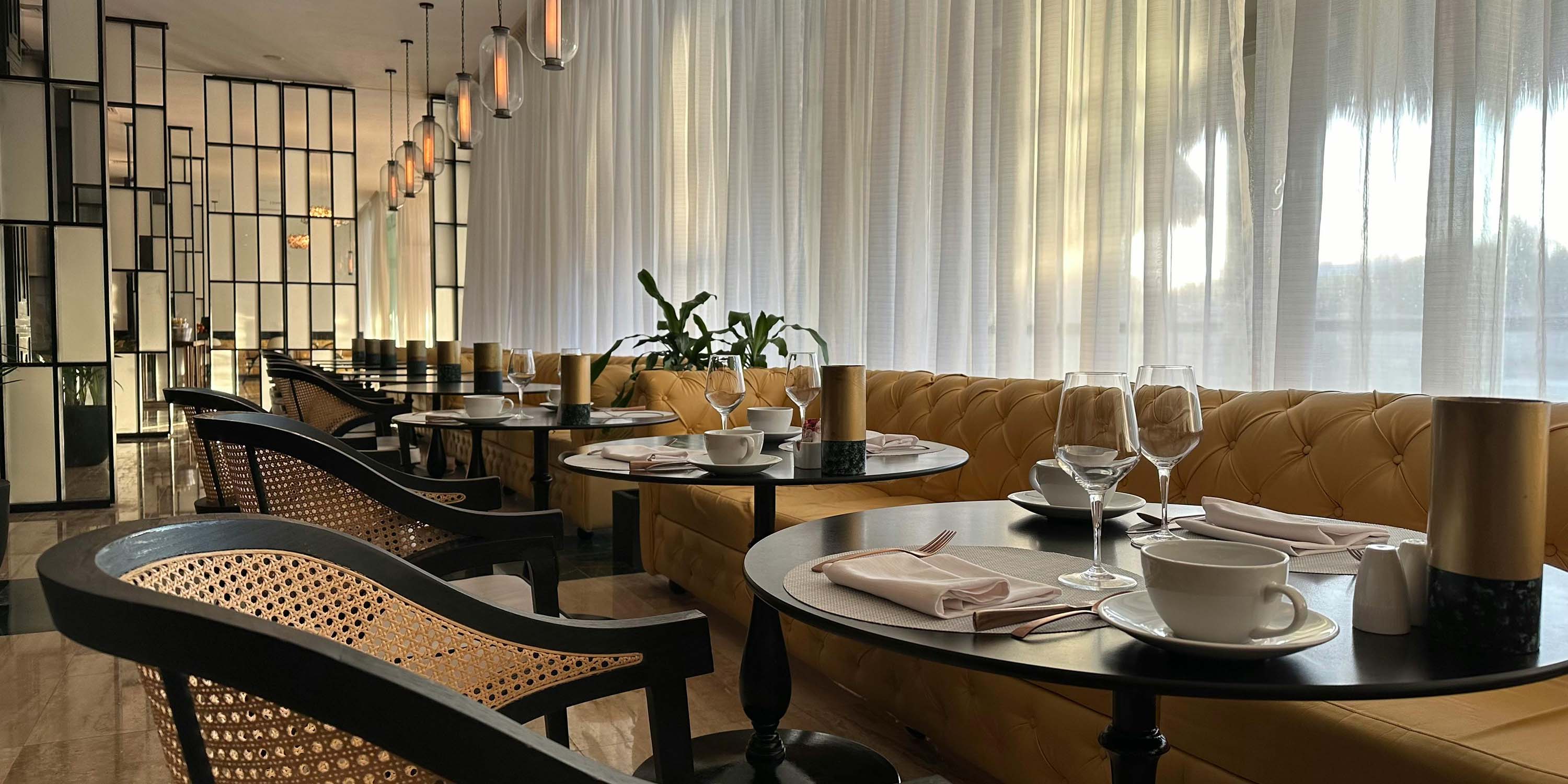 warm toned restaurant with booth and chair seating